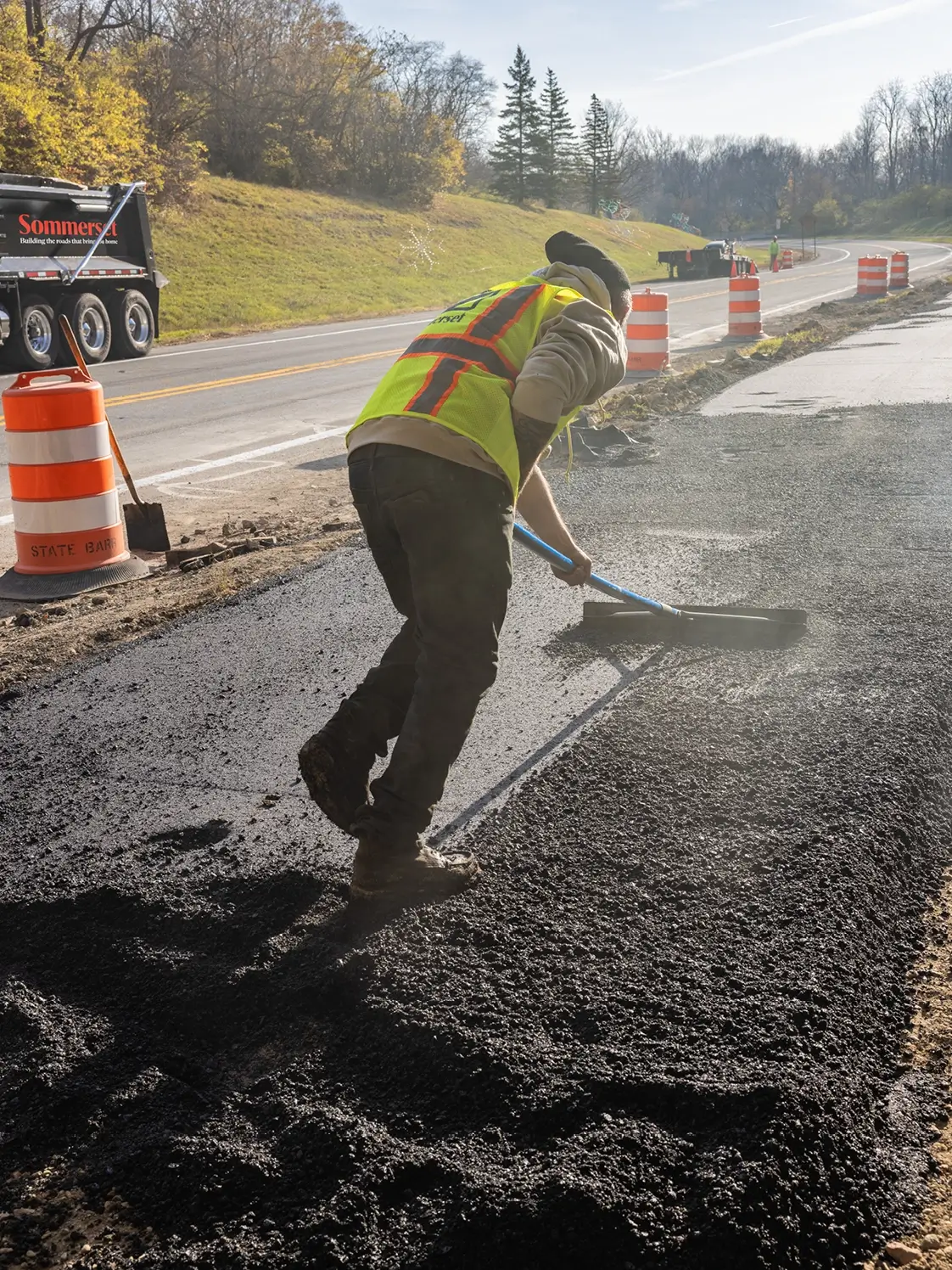 paving a municipal road with asphalt